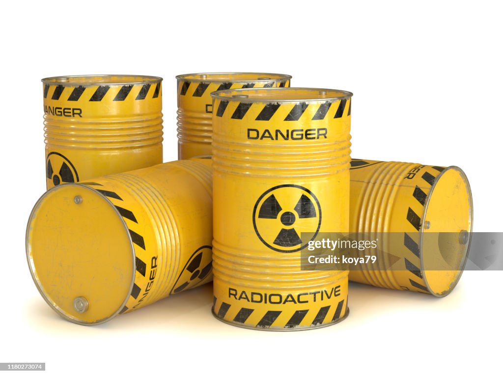 Radioactive waste yellow barrels with radioactive symbol