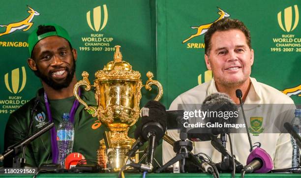 Siya Kolisi of the Springboks and Rassie Erasmus of the Springboks during the South African national rugby team arrival media conference at OR Tambo...
