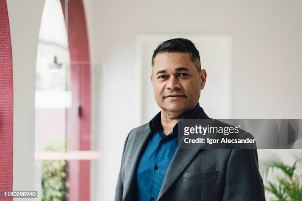 portrait of a medical director at the hospital - blue blazer stock pictures, royalty-free photos & images