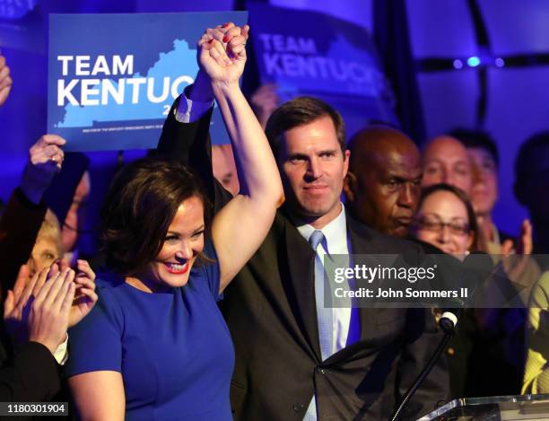 Apparent Gov.-elect Andy Beshear celebrates with supporters after voting results showed the Democrat holding a slim lead over Republican Gov. Matt...