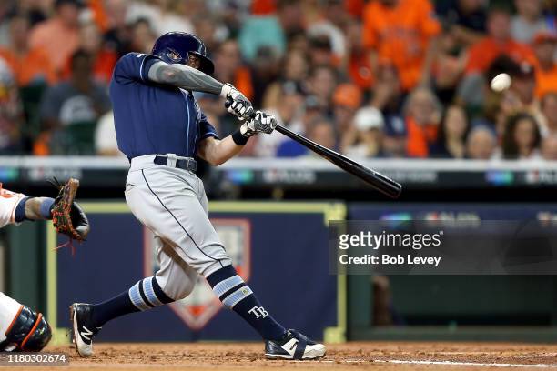Eric Sogard of the Tampa Bay Rays hits a solo home run against the Houston Astros during the second inning in game five of the American League...