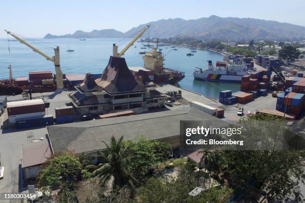 Container ship is docked at a container terminal in this aerial photograph taken in Dili, Timor-Leste, on Monday, Aug. 26, 2019. Twenty years on from...