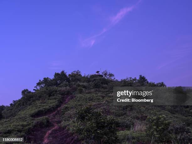 The abandoned Ma Tso Lung Police Post stands atop a hill at dawn in the Ma Tso Lung district of Hong Kong, China, on Monday, Sept. 9, 2019. Hong...