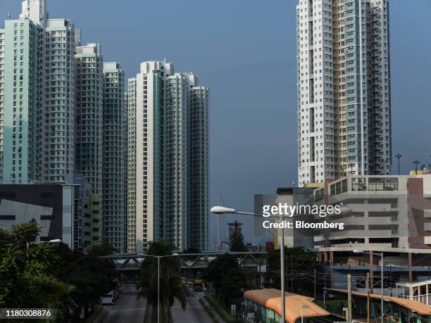 Residential buildings stand in the Tin Shui Wai district of Hong Kong, China, on Monday, Sept. 9, 2019. Hong Kong's waning allure for ambitious...