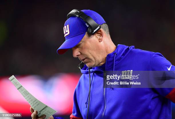 Head coach Pat Shurmur of the New York Giants looks on against the New England Patriots during the second quarter in the game at Gillette Stadium on...