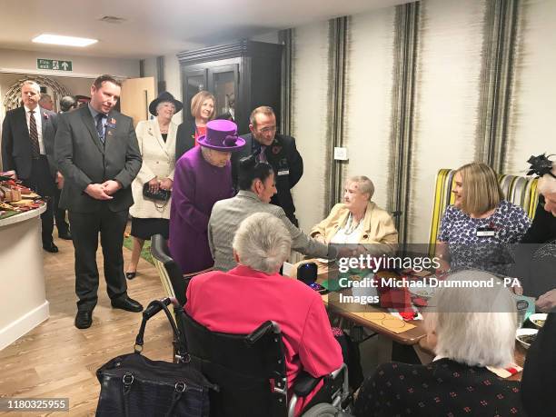 Queen Elizabeth II during a visit to the Royal British Legion Industries village in Aylesford, Kent to celebrate the charity's centenary year.