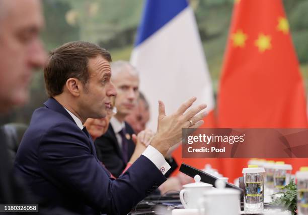 French President Emmanuel Macron speaks during a meeting with Chinese Premier Li Keqiang at The Great Hall Of The People on November 6, 2019 in...