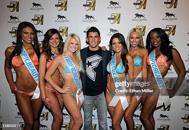 Mixed martial artist Dominick Cruz and Tropic Beauty Model Search contestants arrive at a post-fight party for UFC 132 at Studio 54 inside the MGM...