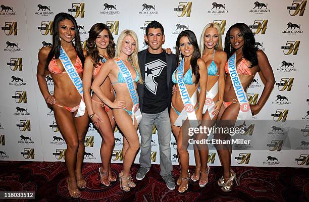 Mixed martial artist Dominick Cruz and Tropic Beauty Model Search contestants arrive at a post-fight party for UFC 132 at Studio 54 inside the MGM...