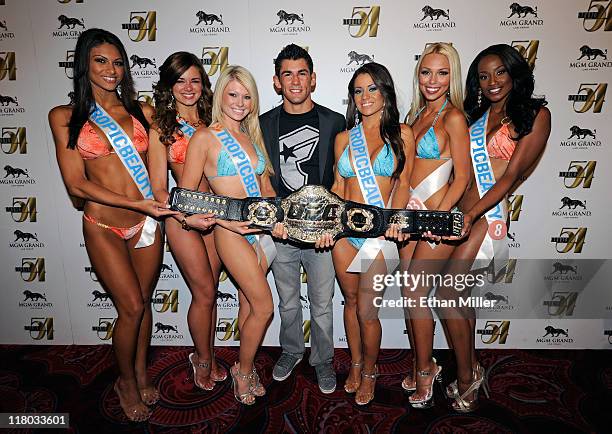 Mixed martial artist Dominick Cruz and Tropic Beauty Model Search contestants arrive at a post-fight party for UFC 132 at Studio 54 inside the MGM...