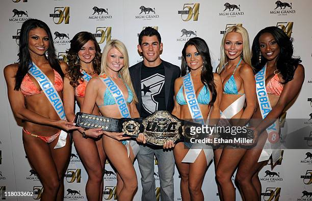 Mixed martial artist Dominick Cruz and Tropic Beauty Model Search contestants arrive at a post-fight party for UFC 132 at Studio 54 inside the MGM...