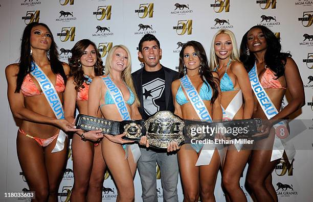 Mixed martial artist Dominick Cruz and Tropic Beauty Model Search contestants arrive at a post-fight party for UFC 132 at Studio 54 inside the MGM...