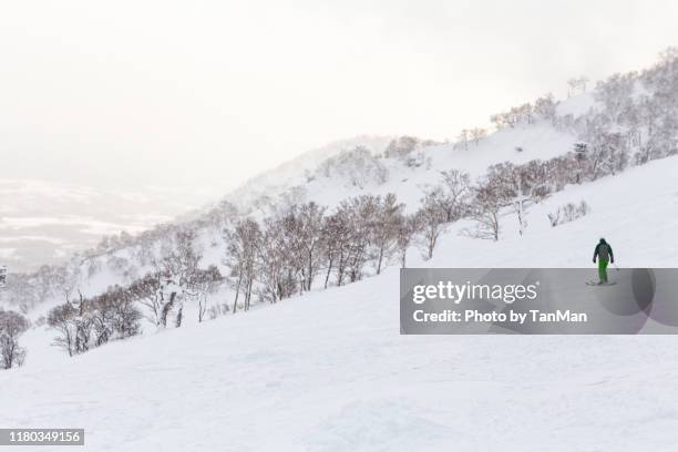 at the slopes. winter in niseko, japan. - japan skiing stock pictures, royalty-free photos & images