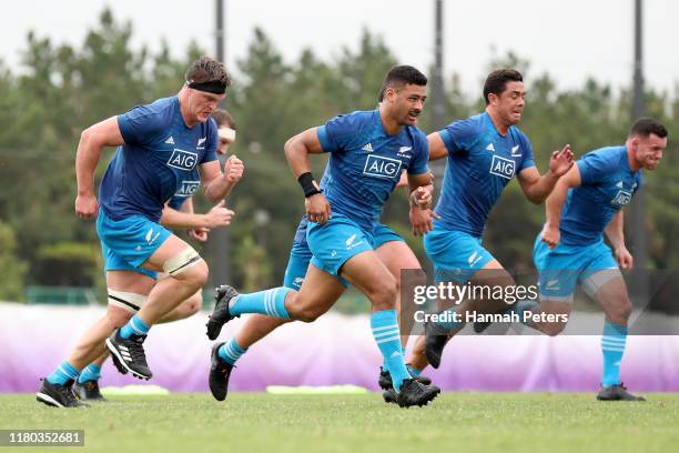 Scott Barrett, Richie Mo'unga, Anton Lienert-Brown and Ryan Crotty run through drills during a New Zealand training session at the Arcs Urayasu Park...