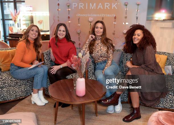 Stacey Solomon, Giovanna Fletcher, Megan Rose Lane and Simone Powderly poses before taking part in a panel discussion at the VIP launch party...