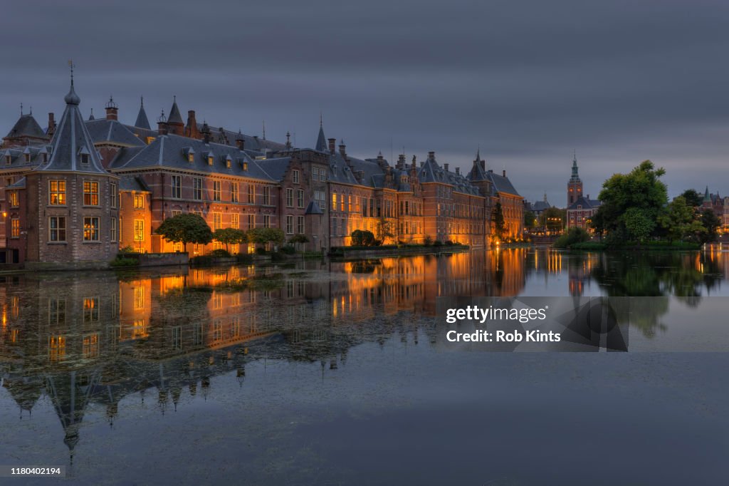 Dutch Houses of Parliament ( Binnenhof ) reflected in the Court Pond ( Hofvijver )