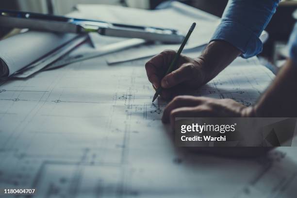 engineer working late - architect stock pictures, royalty-free photos & images