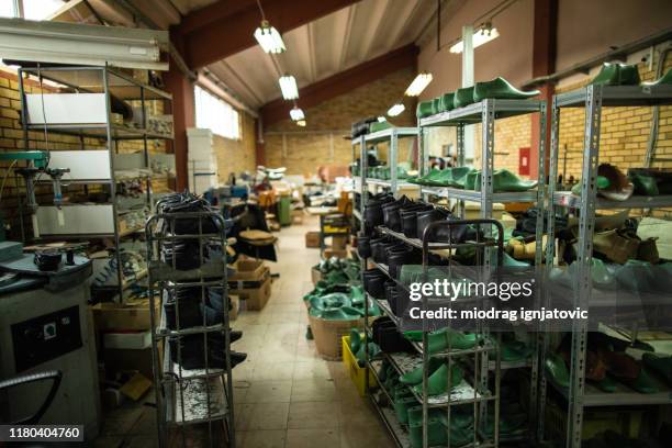 inside of locally shoe factory - shoe factory stock pictures, royalty-free photos & images