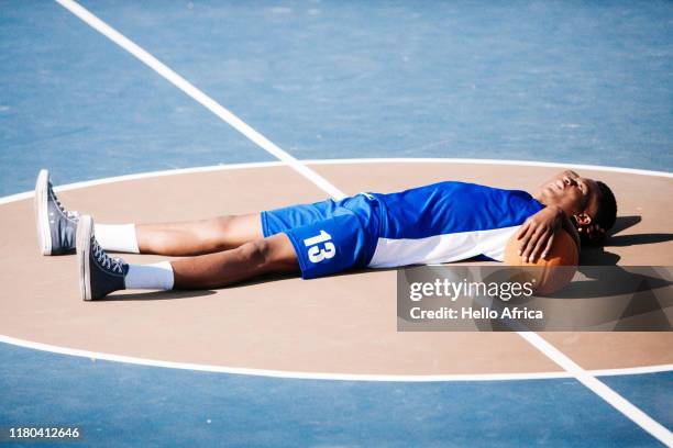 Basketball Player Collapses Photos and Premium High Res Pictures Basketball Player Collapses Photos and Premium High Res Pictures