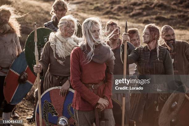 three strong viking women in the highlands - viking stock pictures, royalty-free photos & images