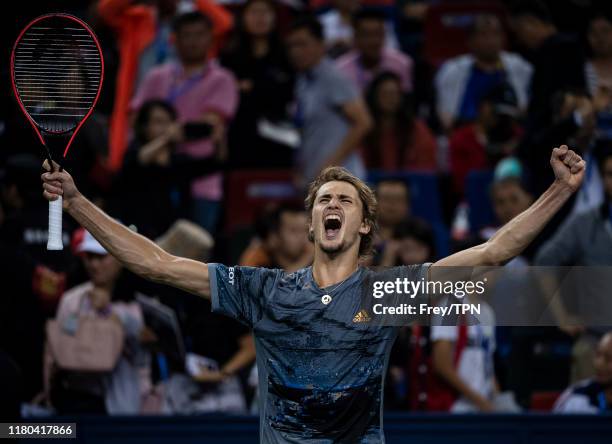 Alexander Zverev of Germany celebrates his victory over Roger Federer of Switzerland in the quarter Finals of the Rolex Shanghai Masters at the Qi...