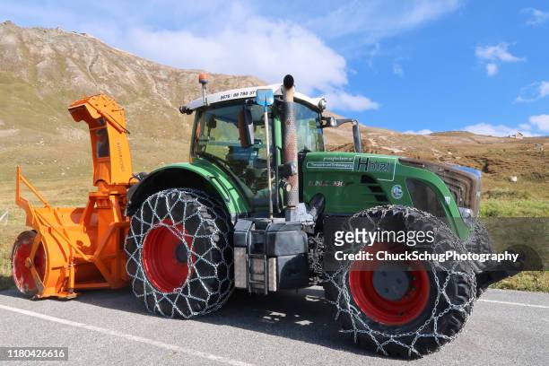 snowplow chain tires austrian alps snow equipment - snow blower stock pictures, royalty-free photos & images