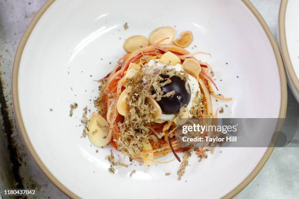 Atmosphere during a collaborative dinner between Alain Ducasse, Dan Barber, and Laetitia Rouabah during the 2019 New York City Wine and Food Festival...