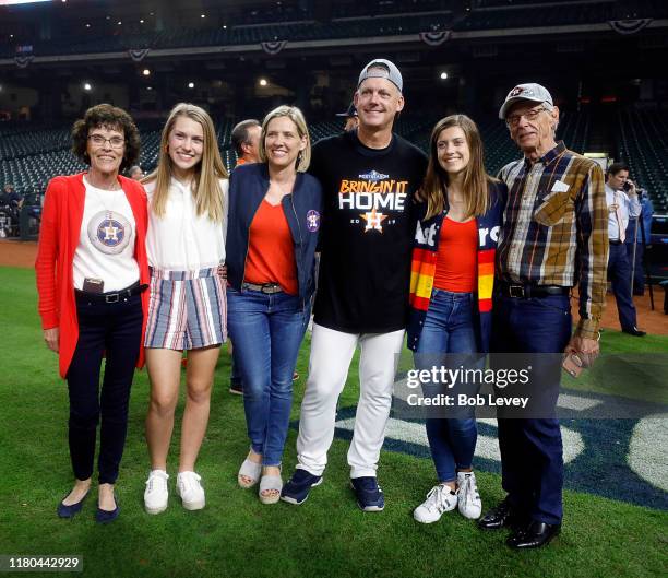 Manager AJ Hinch of the Houston Astros and family on the field after Game 5 of the ALDS against the Tampa Bay Rays at Minute Maid Park on October 10,...