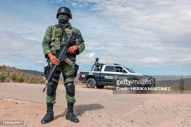 Members of the National Guard stand guard near La Morita ranch, belonging to the Mexican-American LeBaron family -of which nine members were killed...