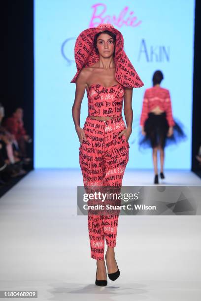 Model walks the runway during the Barbie by Cigdem Akin show during Mercedes-Benz Istanbul Fashion Week at Zorlu Performance Hall on October 11, 2019...