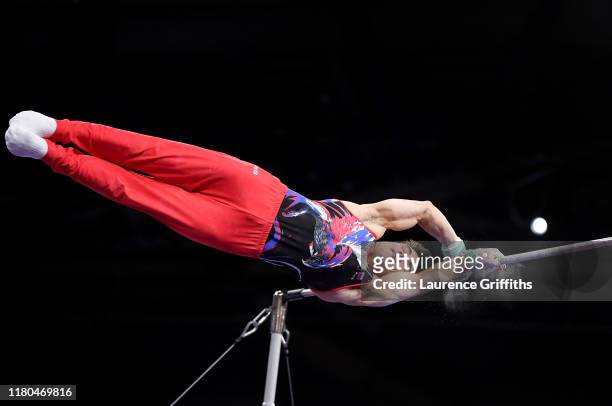 Artur Dalaloyan of Russia competes on High Bar during The Men's All-Around Final of the FIG Artistic Gymnastics World Championships at Hanns Martin...