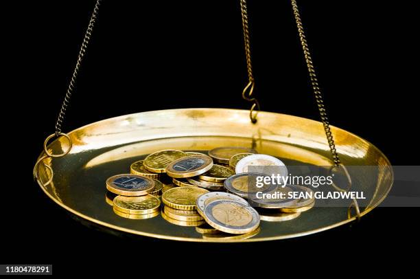 Euros On Scales, Foto de stock