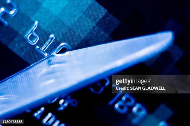 cutting up credit card - borrowing stock pictures, royalty-free photos & images