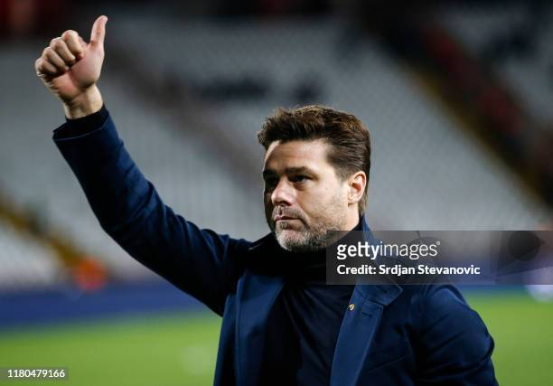 Head coach Mauricio Pochettino of Tottenham Hotspur acknowledges to the Crvena Zvezda fans after the UEFA Champions League group B match between...