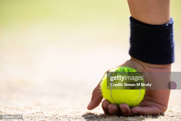 Detail of a ball boys hand with the tennis ball at The Wimbledon Lawn Tennis Championship at the All England Lawn and Tennis Club at Wimbledon on...