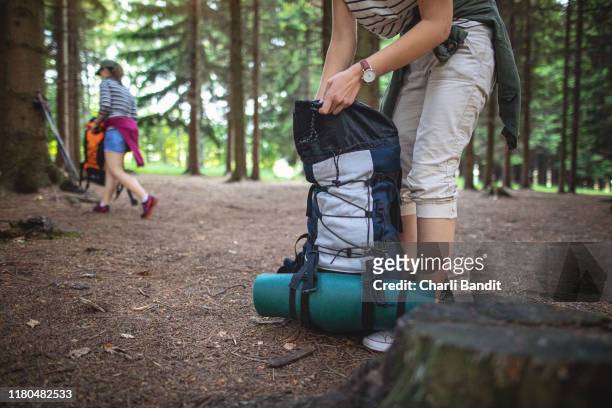 unpacking while on vacation - open rucksack stock pictures, royalty-free photos & images