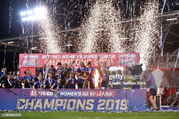 Leeds Rhinos players celebrate after they win the Betfred Womens Supper League cup after the Betfred Womens Super League Grand Final match between...