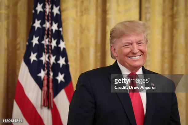 President Donald Trump looks on during an event about judicial confirmations in the East Room of the White House on November 6, 2019 in Washington,...