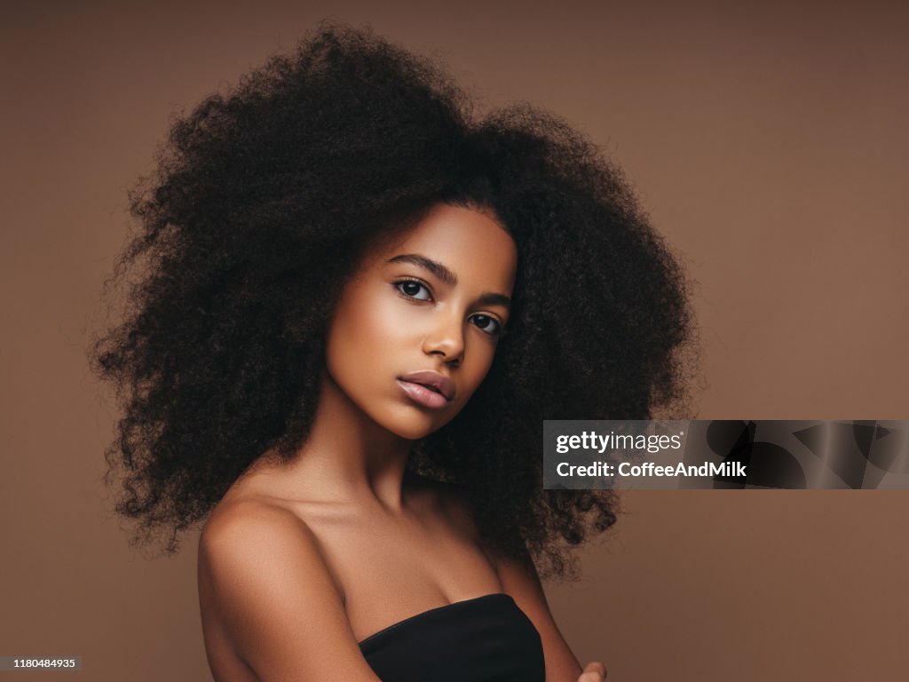 Beautiful Girl With Curly Hairstyle High-Res Stock Photo - Getty Images