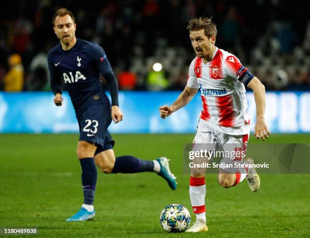 Marko Marin of Crvena Zvezda in action against Christian Eriksen of Tottenham Hotspur during the UEFA Champions League group B match between Crvena...