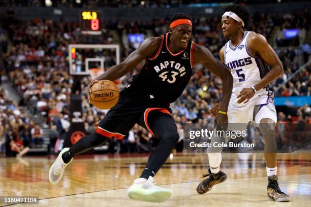 Pascal Siakam of the Toronto Raptors drives to the net on De'Aaron Fox of the Sacramento Kings during second half of their NBA game at Scotiabank...