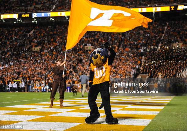 Tennessee Volunteers mascot Davy Crockett and Smokey celebrate after a touchdown during a game between the Tennessee Volunteers and UAB Blazers on...