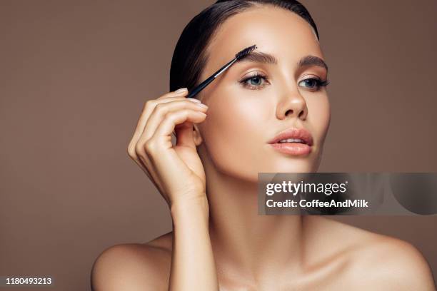 professional eyebrow care - eyelashes stock pictures, royalty-free photos & images
