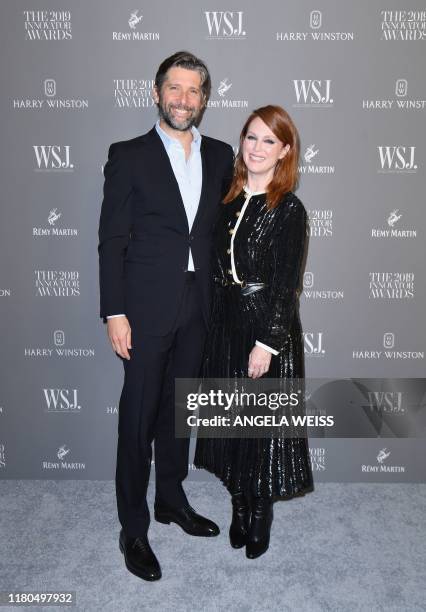 Actress Julianne Moore and husband US director Bart Freundlich attend the WSJ Magazine 2019 Innovator Awards at MOMA on November 6, 2019 in New York...