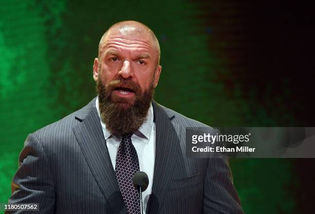 Executive Vice President of Talent, Live Events and Creative Paul "Triple H" Levesque speaks at a WWE news conference at T-Mobile Arena on October...