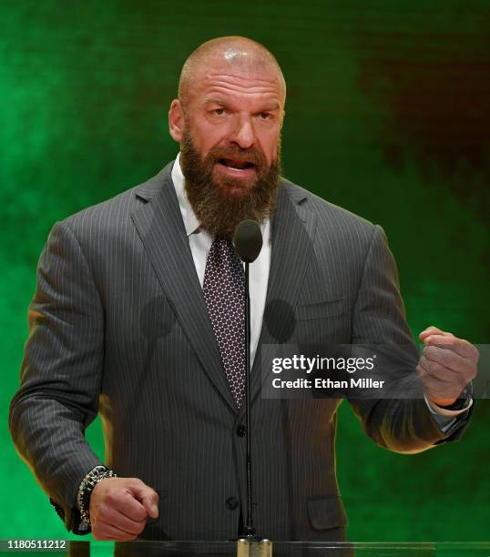 Executive Vice President of Talent, Live Events and Creative Paul "Triple H" Levesque speaks at a WWE news conference at T-Mobile Arena on October...