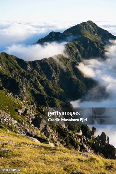 hiking around senjojiki cirque - senjojiki cirque stock pictures, royalty-free photos & images