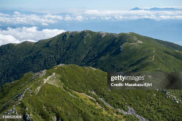 hiking around senjojiki cirque - senjojiki cirque stock pictures, royalty-free photos & images