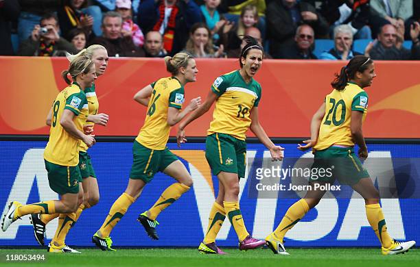 Player of Australia celebrate after Emily van Egmond scored their second goal during the FIFA Women's World Cup 2011 Group D match between Australia...