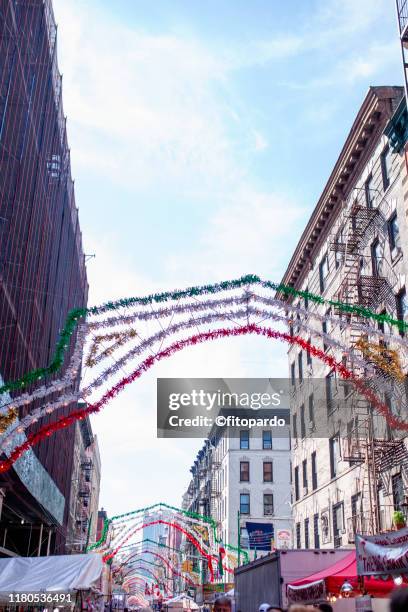 the feast of san gennaro in little italy new york city - san gennaro festival stock pictures, royalty-free photos & images
